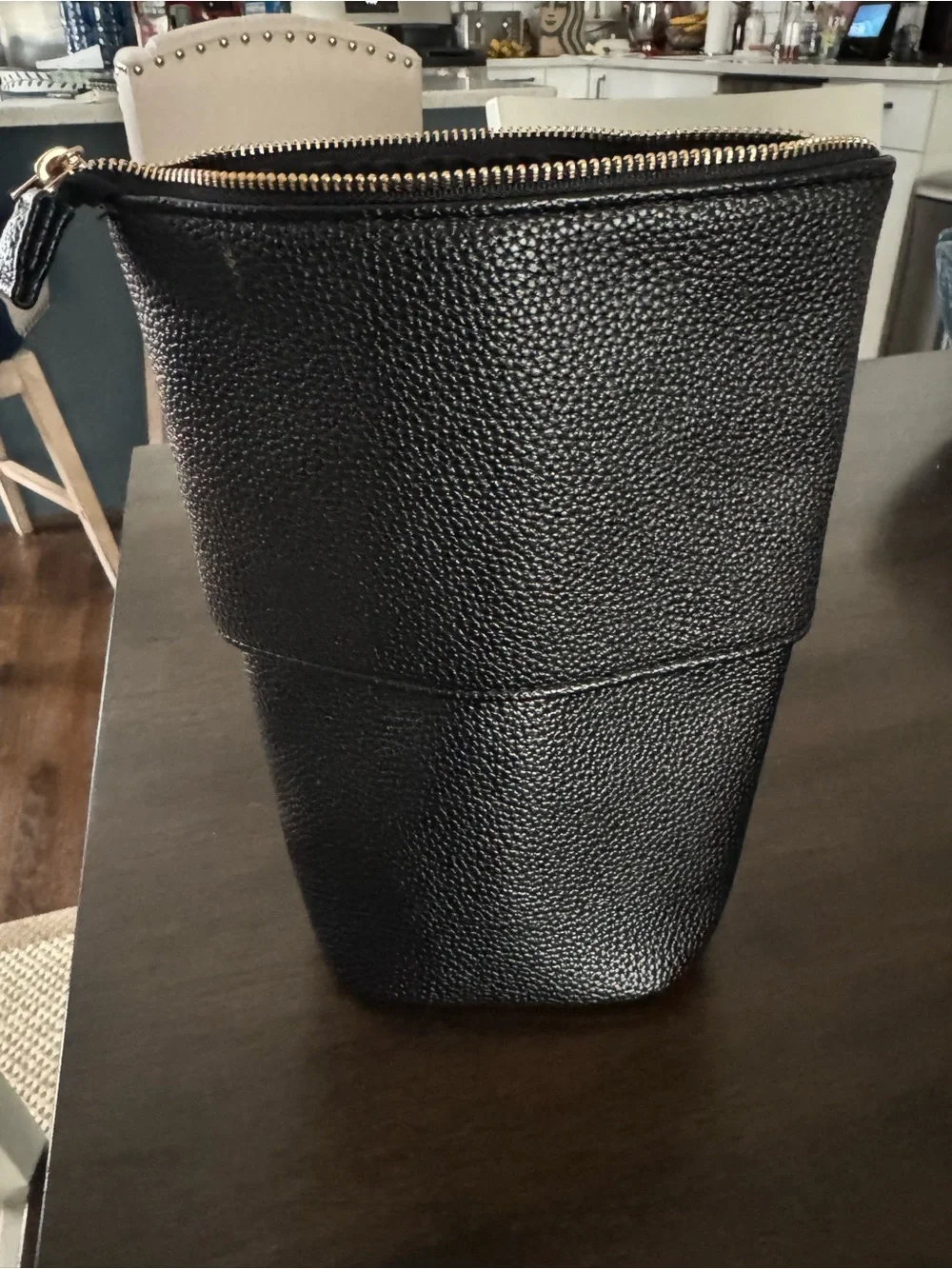 Sleek Black Pebbled Cosmetic Pouch with Gold Hardware